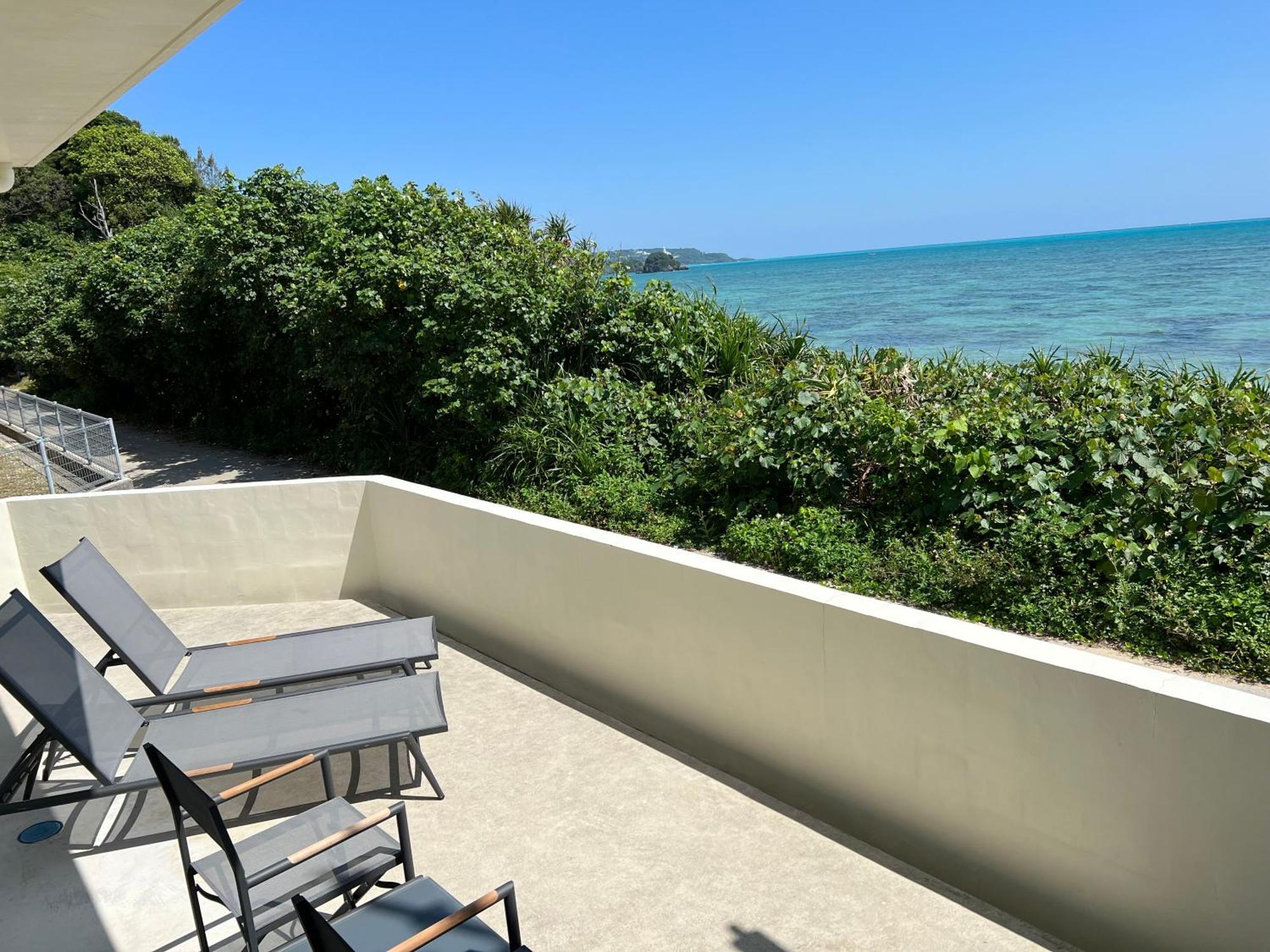 Ocean Front Sumuide Apartment Nago Exterior photo